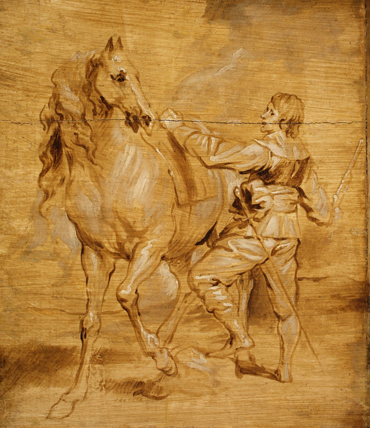 Wooden carving of a man on horseback with a sword